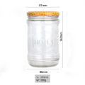 Empty round 585ml food grade glass honey jam chilli sauce storage jar with metal lid